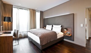 Ropa de cama de alta calidad y minibar 