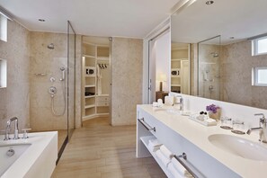 Separate tub and shower, deep soaking tub, designer toiletries