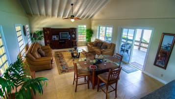 Panoramic Suite, 2 Bedrooms, Kitchen, Beachfront | Living area | 27-inch flat-screen TV with cable channels, TV, DVD player