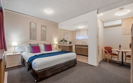 Queen Spa Suite | Premium bedding, blackout drapes, iron/ironing board, free WiFi