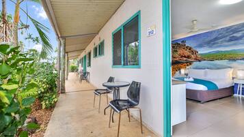 Room 312 offers a serene view of the surrounding landscape from its window.