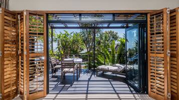Luxury Suite, 1 Bedroom, Fireplace, Sea View | Living area | 40-inch TV with satellite channels, Netflix, streaming services