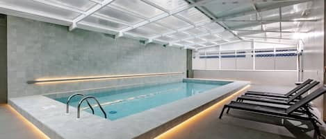 Indoor pool, sun loungers