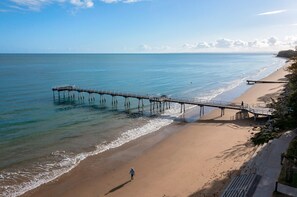 Walk along the pier and enjoy the ocean views from this scenic beach.