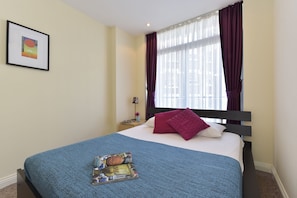 Individually decorated, individually furnished, desk, blackout curtains