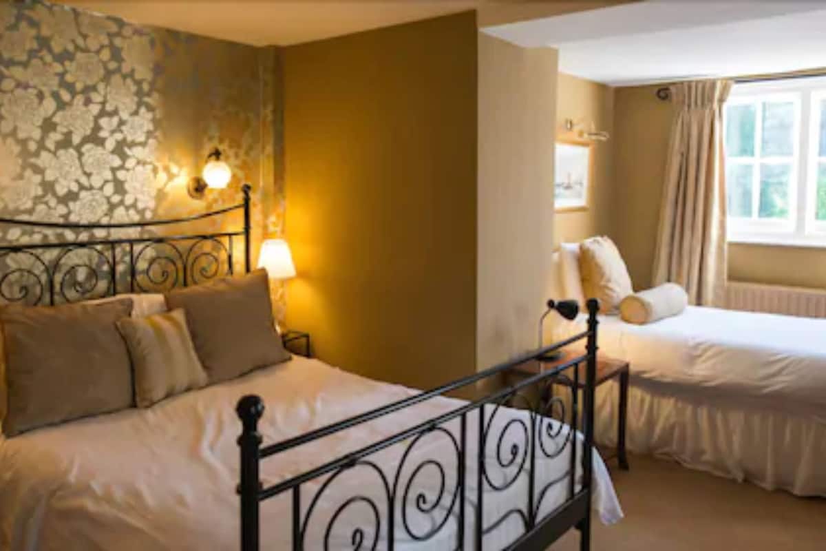 family room | premium bedding, desk, soundproofing, iron/ironing board