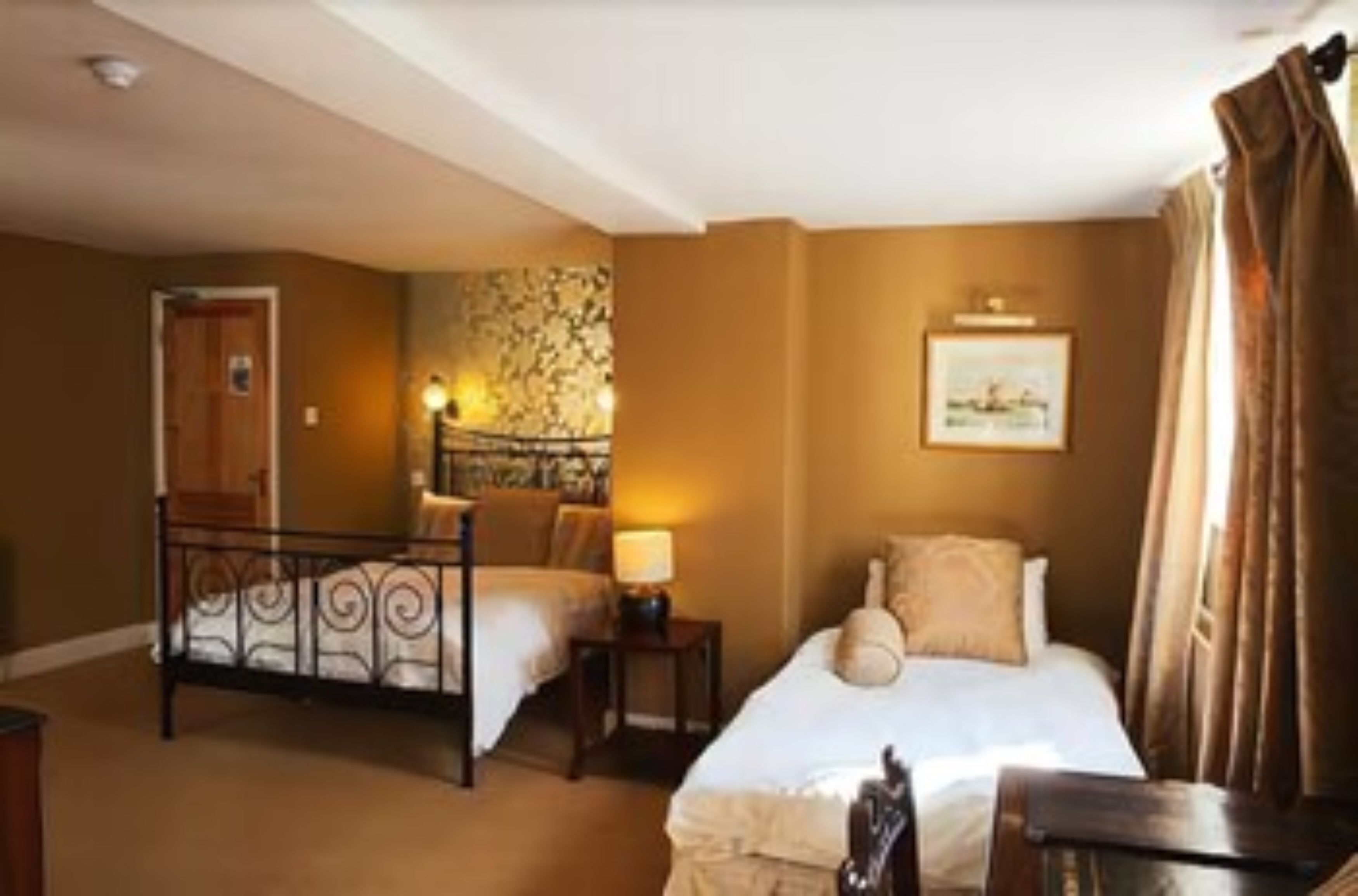 family room | premium bedding, desk, soundproofing, iron/ironing board