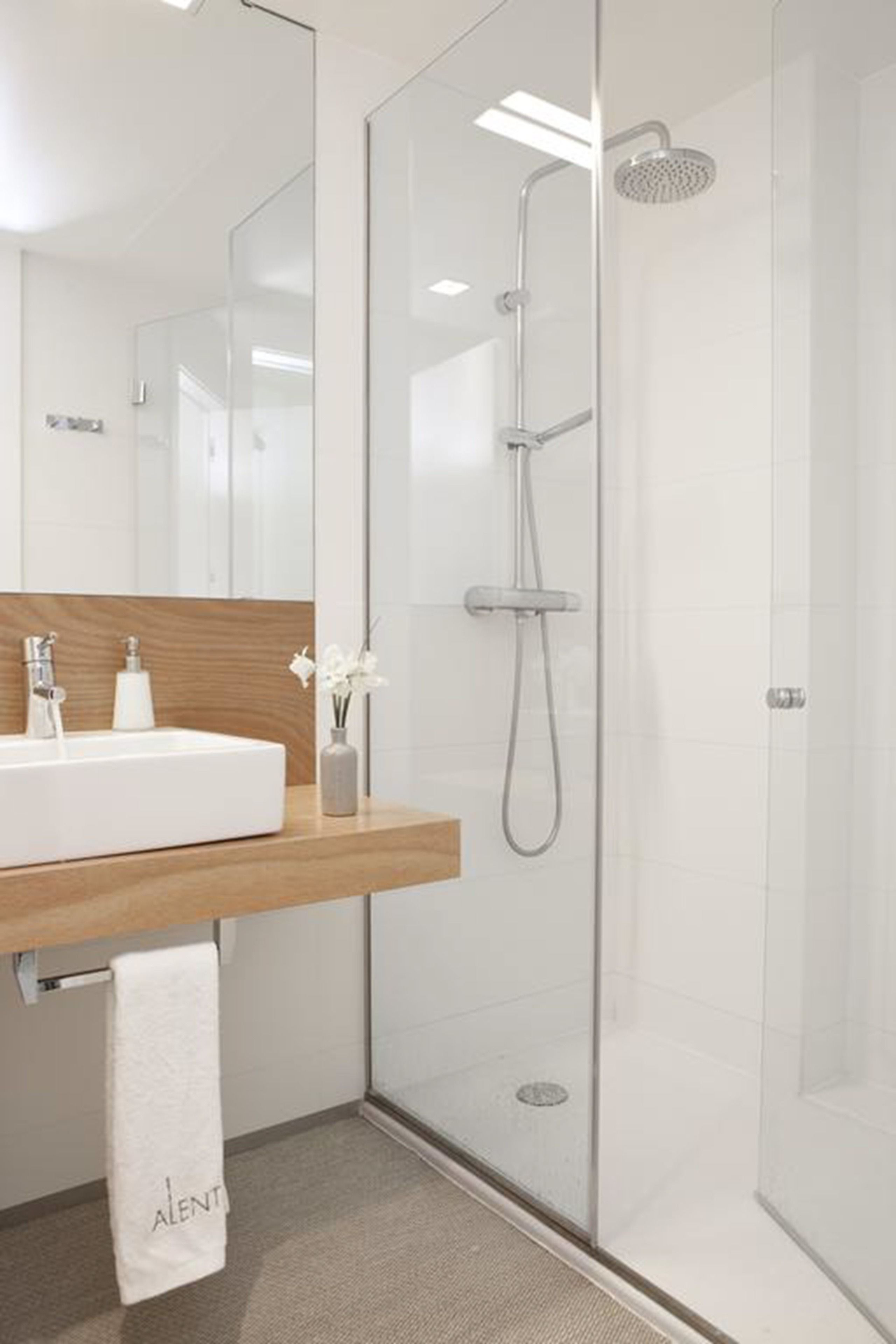 designer toiletries, hair dryer, towels