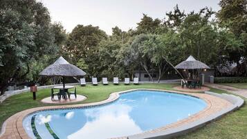 Outdoor pool, pool umbrellas, sun loungers