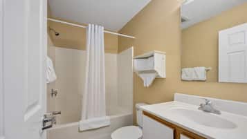 Suite, 1 Bedroom | Bathroom | Combined shower/tub, towels