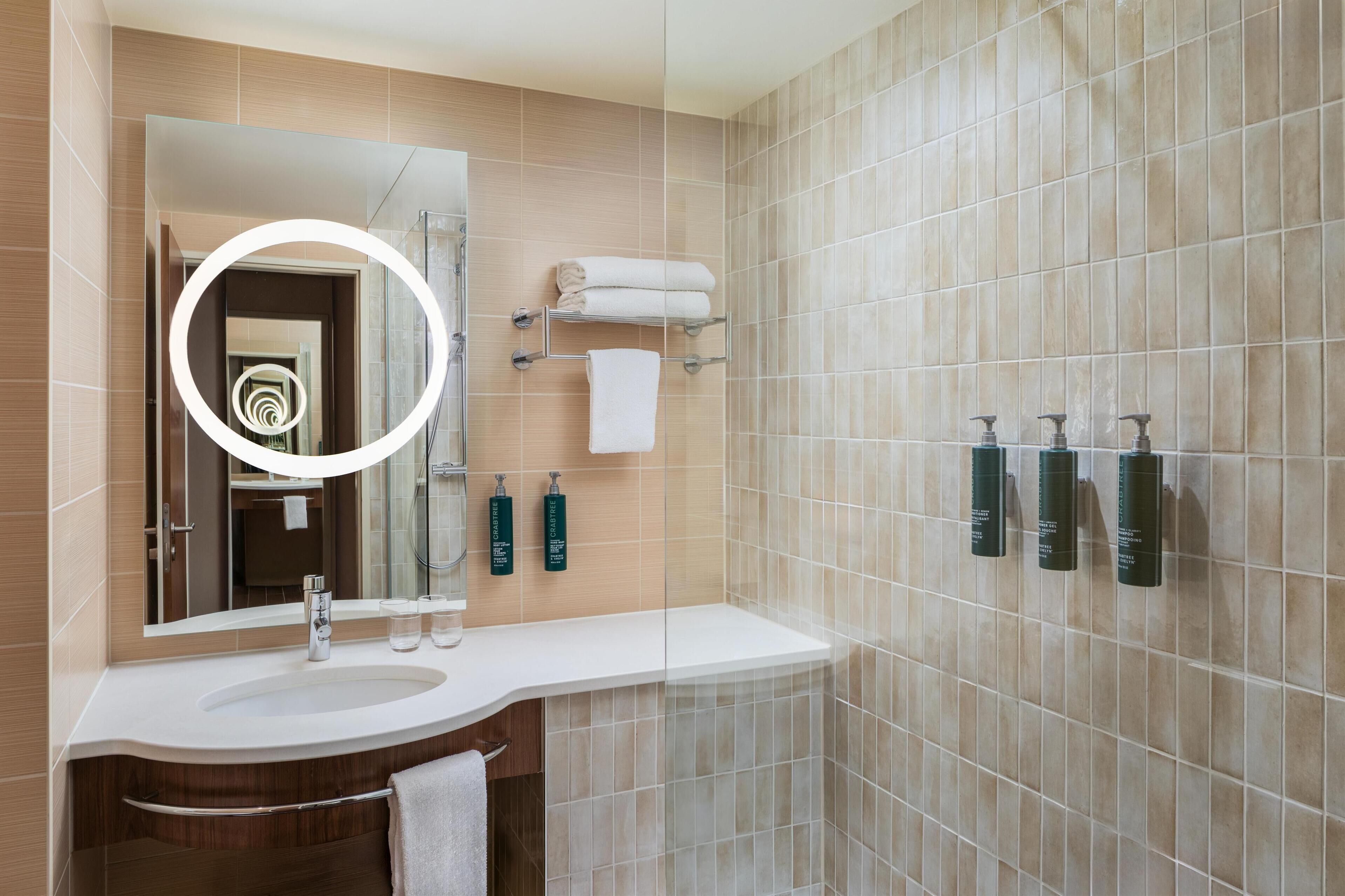 combined shower/bathtub, deep-soaking bathtub, eco-friendly toiletries