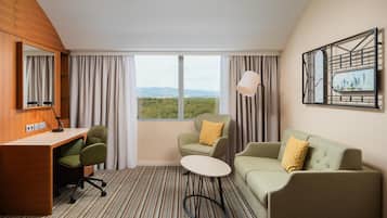 Junior Suite, 1 King Bed | In-room safe, desk, laptop workspace, soundproofing