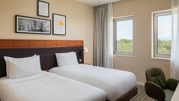 Room, 2 Twin Beds (Evolution) | In-room safe, desk, laptop workspace, soundproofing