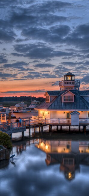 A waterfront property with a dock, a tower, and a house. - Smithfield Station (Smithfield)
