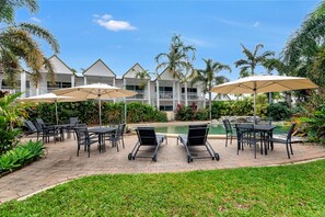 Outdoor pool, open 7:00 AM to 9:00 PM, pool loungers - Titree Village Holiday Apartments (Port Douglas)