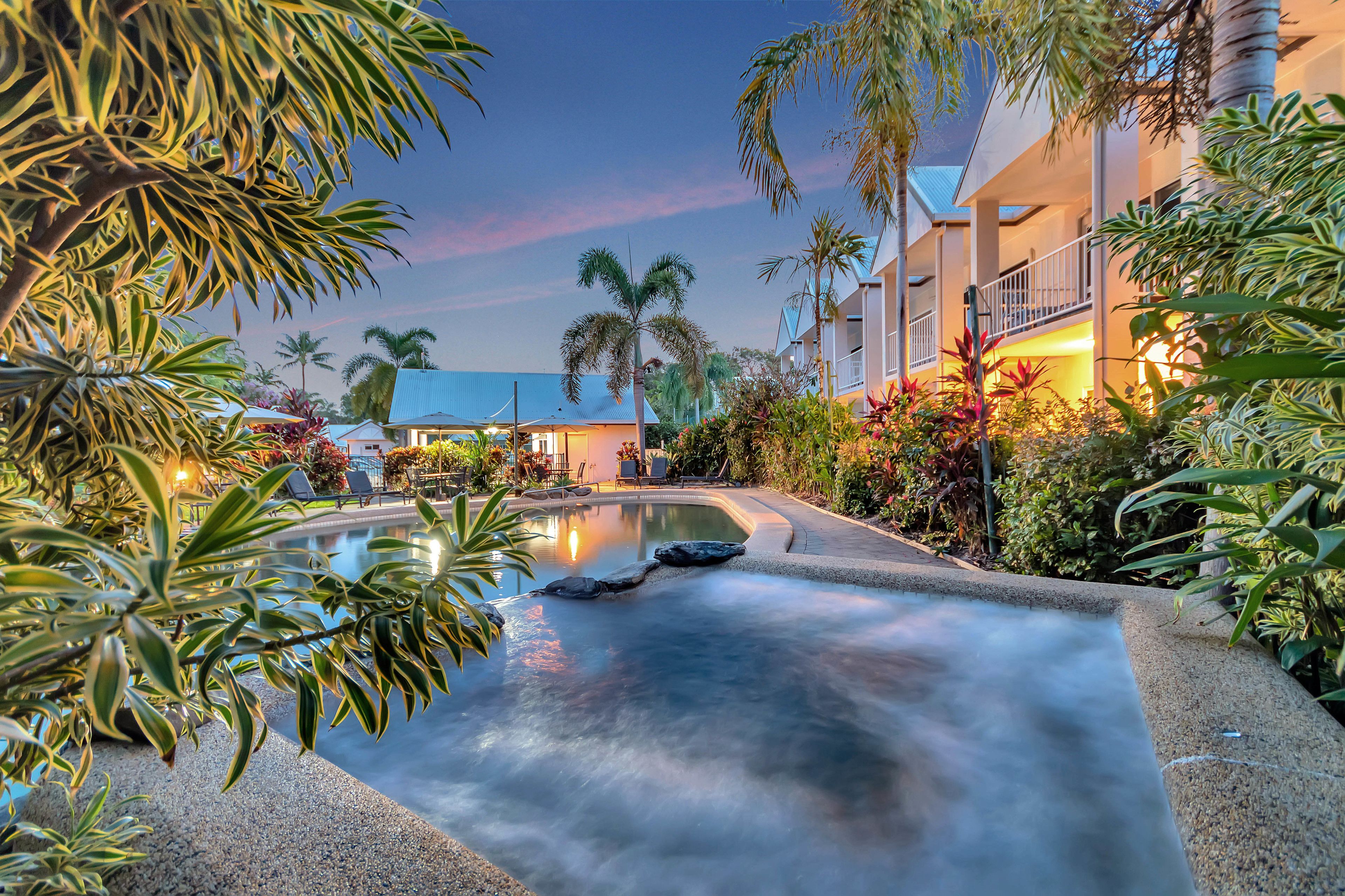 Outdoor pool, open 7:00 AM to 9:00 PM, pool loungers