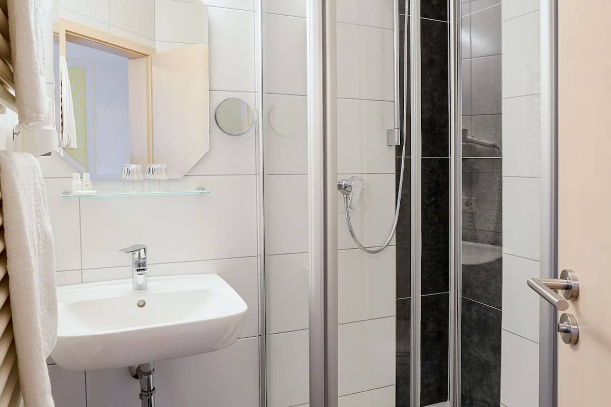 single room | bathroom | shower, free toiletries, hair dryer, towels