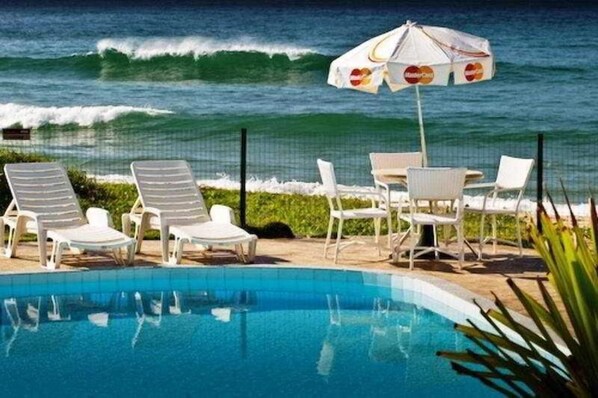 Outdoor pool, pool umbrellas, pool loungers