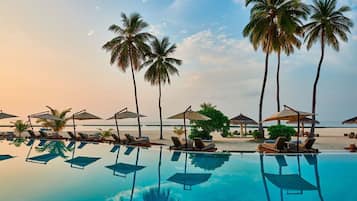 Outdoor pool, pool umbrellas, pool loungers