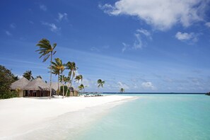 Private beach, white sand, free beach cabanas, sun loungers