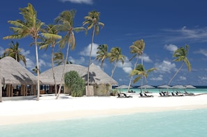 Private beach, white sand, free beach cabanas, sun loungers