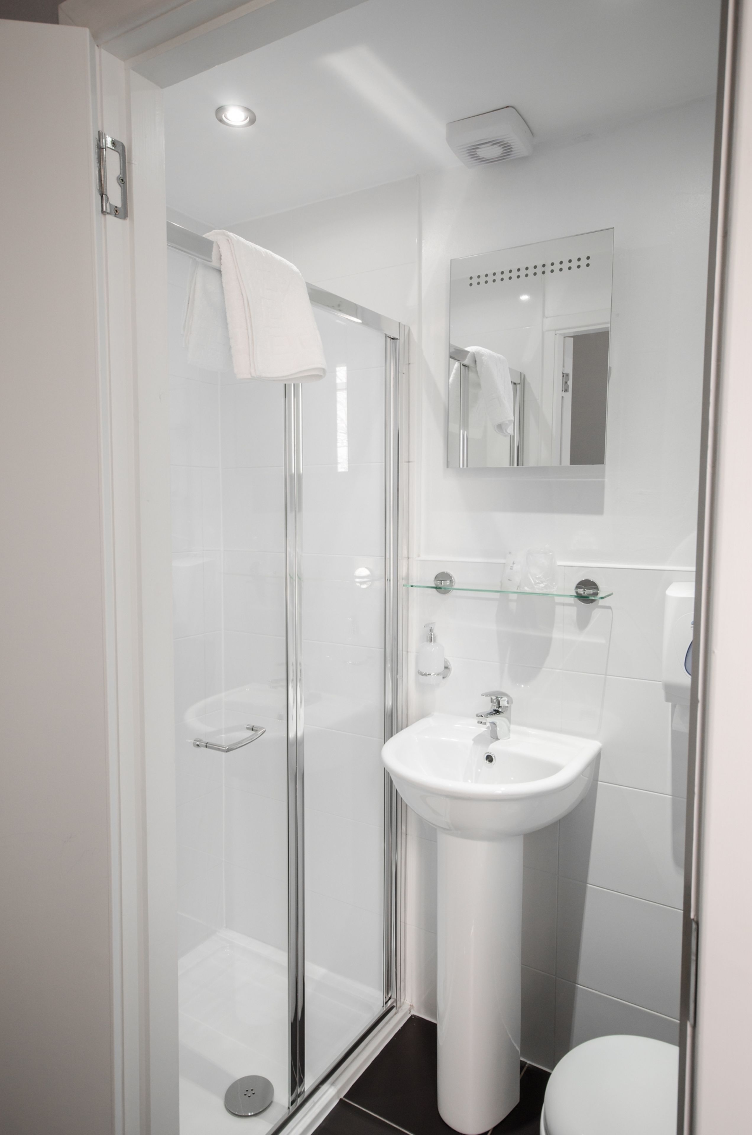 single room | bathroom | shower, hair dryer, towels