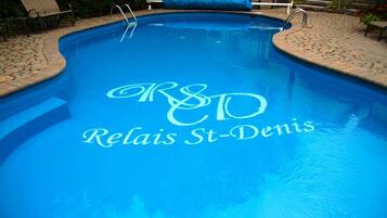 Outdoor pool, a heated pool, open 8:00 AM to 11:00 PM, sun loungers