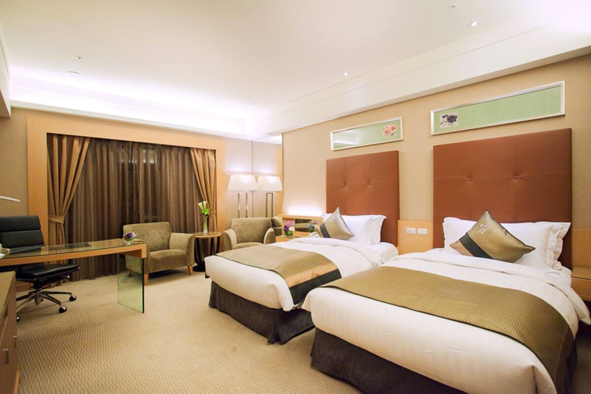 Hypo-allergenic bedding available, down comforters, in-room safe, desk