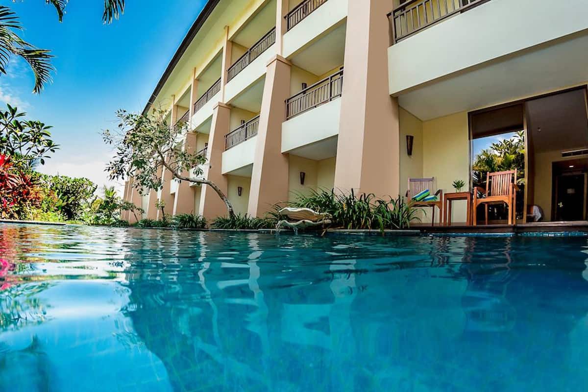 Deluxe Room ( Deluxe Lagoon) | In-room safe, desk, blackout drapes, iron/ironing board