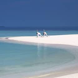 On the beach, white sand, free beach cabanas, sun loungers