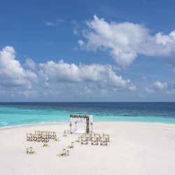 On the beach, white sand, free beach cabanas, sun loungers
