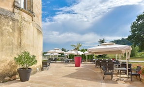 Dinner served, French cuisine, garden views
