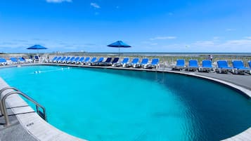 Seasonal outdoor pool, open 8:00 AM to 8:00 PM, pool umbrellas