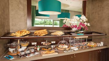 Daily buffet breakfast (EUR 18 per person)