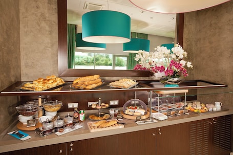 Daily buffet breakfast (EUR 18 per person)