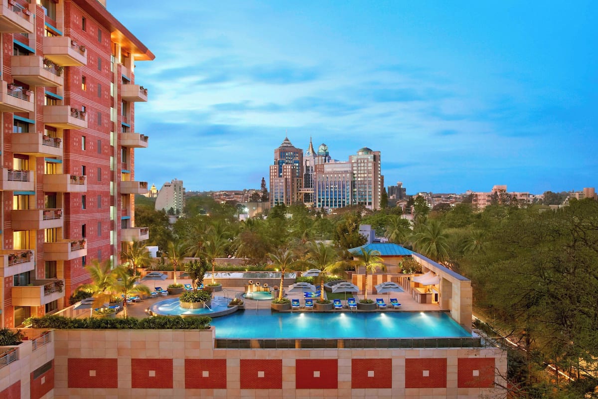 outdoor pool, pool umbrellas, pool loungers