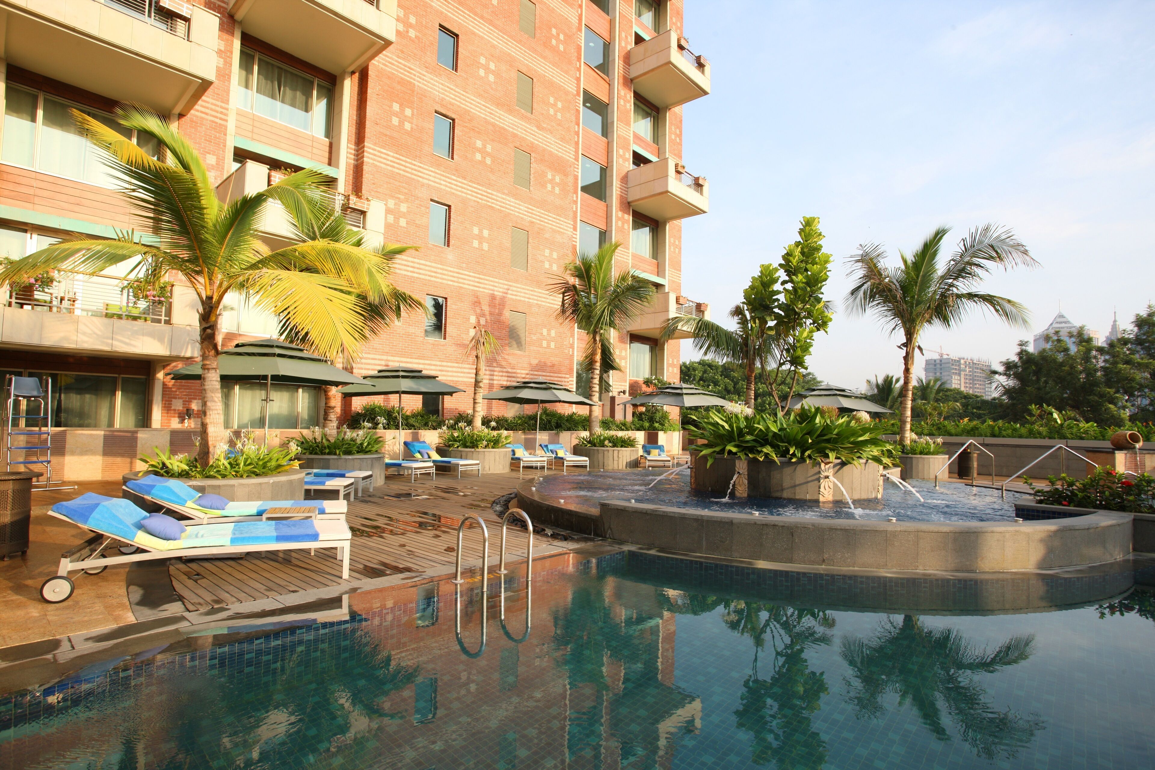 outdoor pool, pool umbrellas, pool loungers