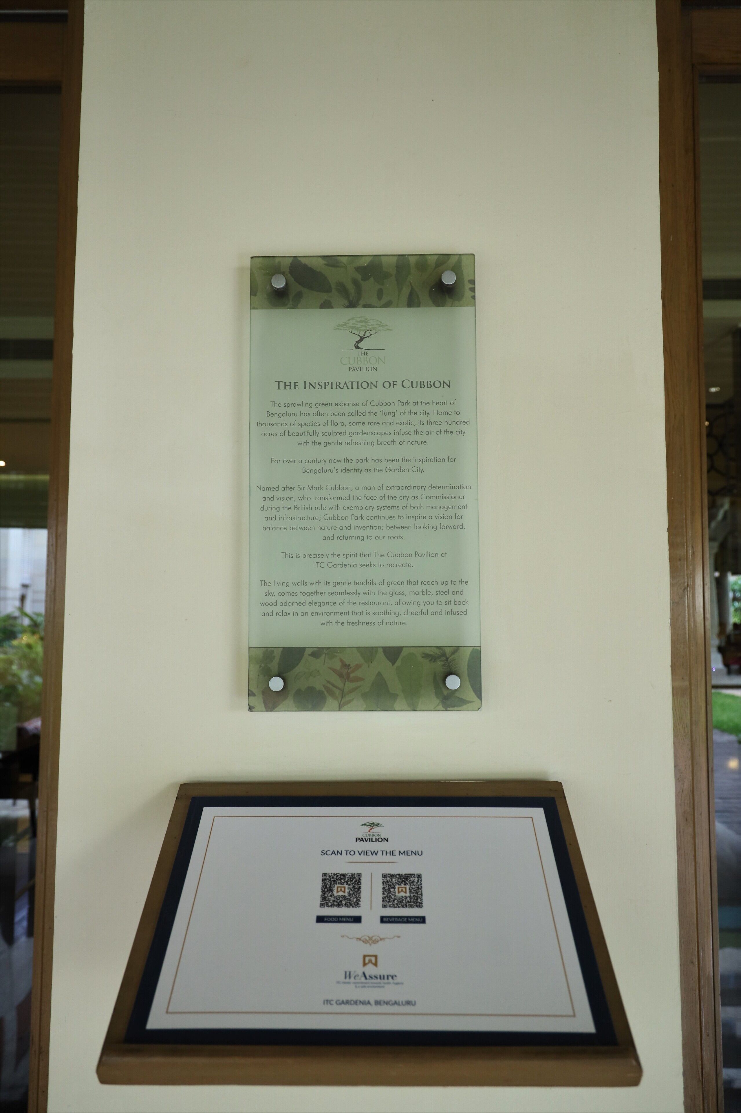A framed informational plaque about Cubbon Park, including a QR code for more details.
