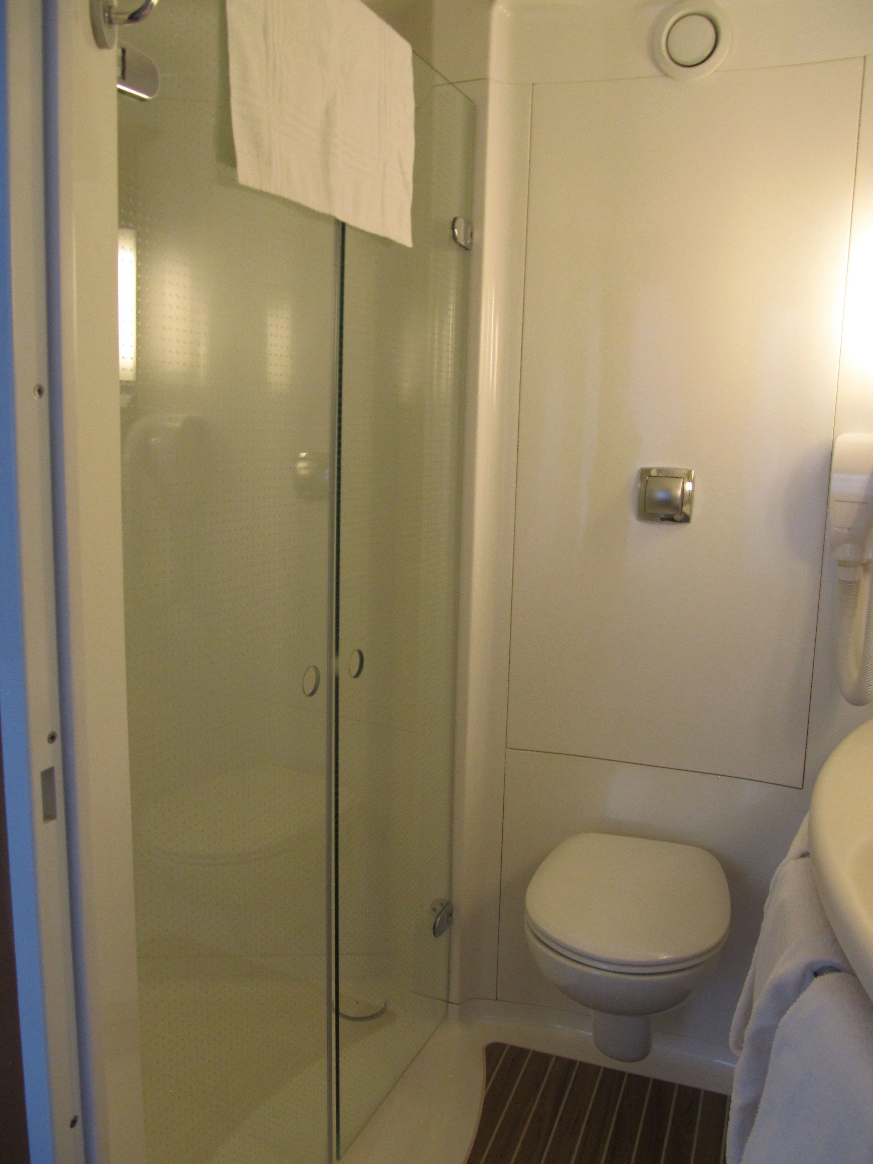 eco-friendly toiletries, hair dryer, towels