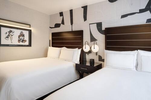 Frette Italian sheets, premium bedding, pillowtop beds, in-room safe