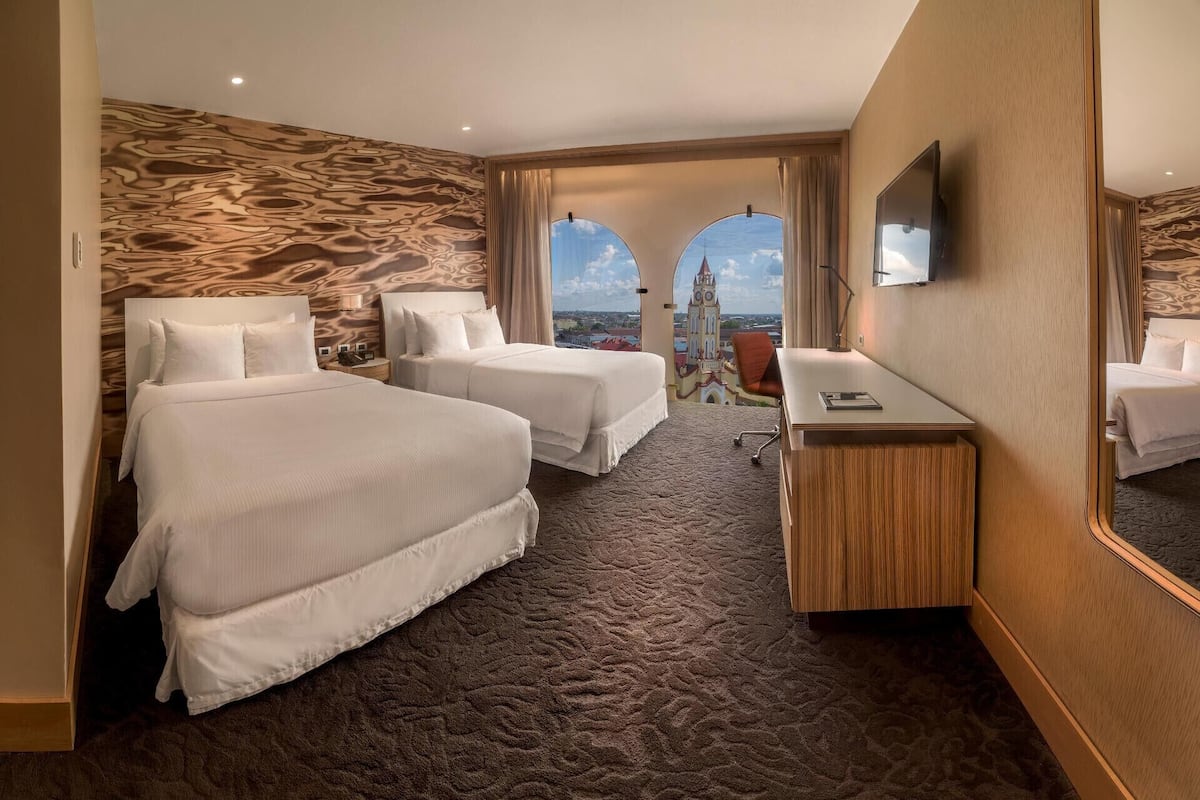Premium bedding, down duvets, minibar, in-room safe