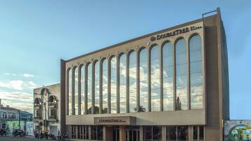 DoubleTree Hotel features a modern architectural design with a series of vertical windows.