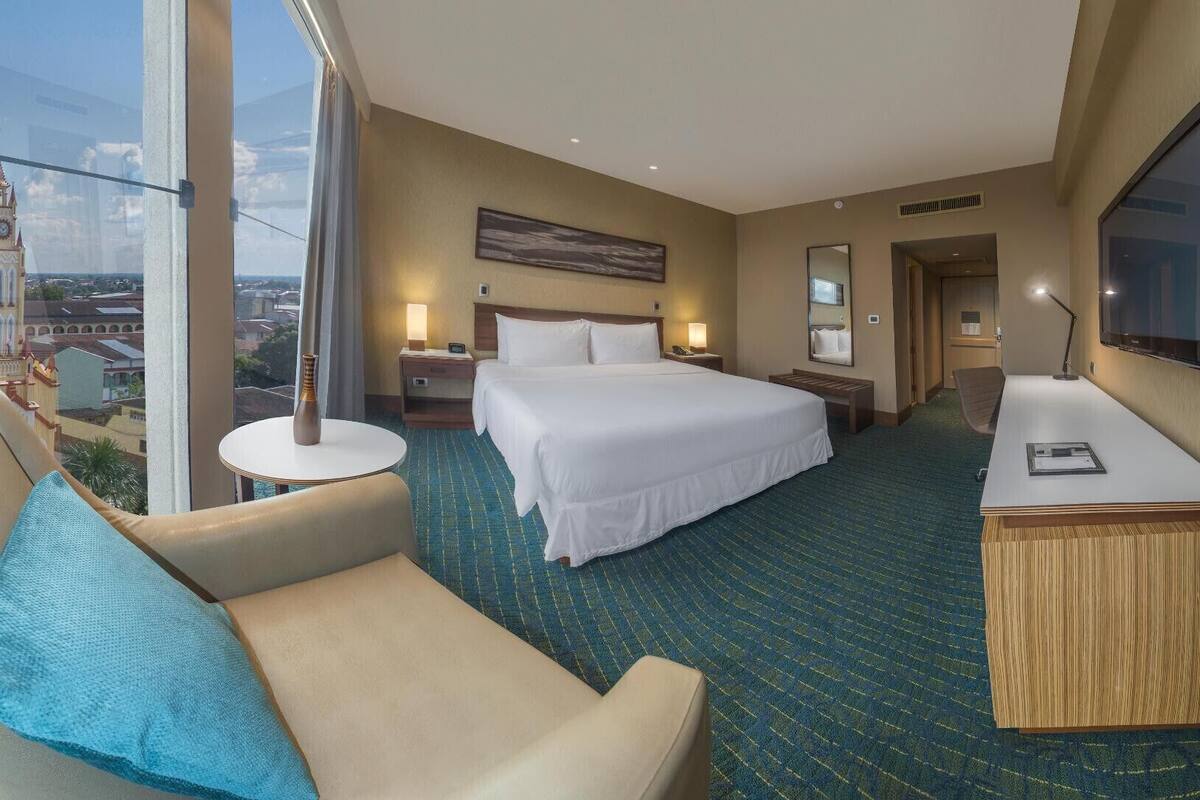 Premium bedding, down comforters, minibar, in-room safe
