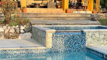 2 outdoor pools, open 8:00 AM to 7:00 PM, pool umbrellas, sun loungers