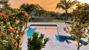 2 outdoor pools, open 8:00 AM to 7:00 PM, pool umbrellas, pool loungers