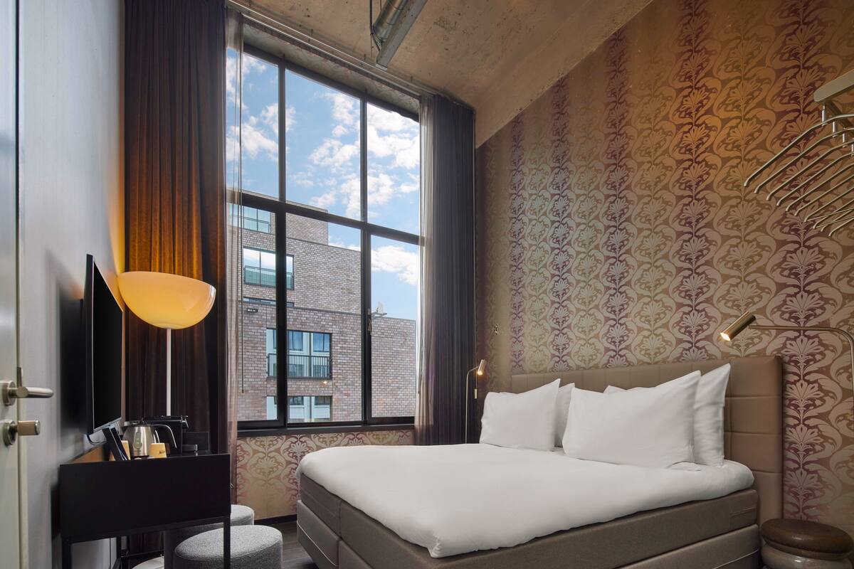 Matchbox | In-room safe, desk, laptop workspace, blackout curtains