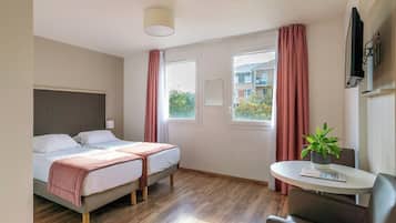 Desk, laptop workspace, blackout curtains, iron/ironing board