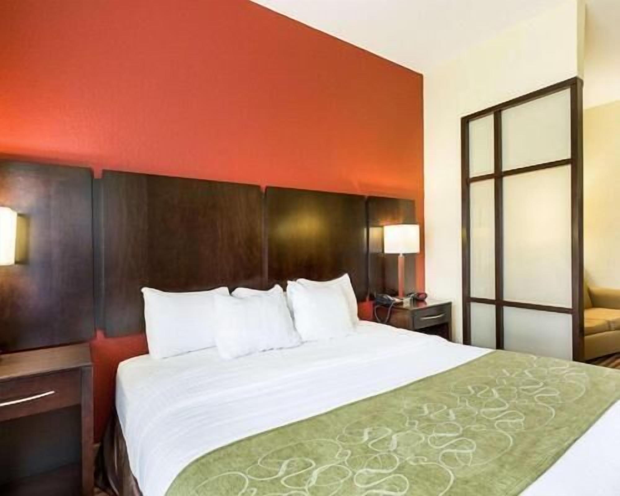 Pillowtop beds, desk, blackout drapes, iron/ironing board