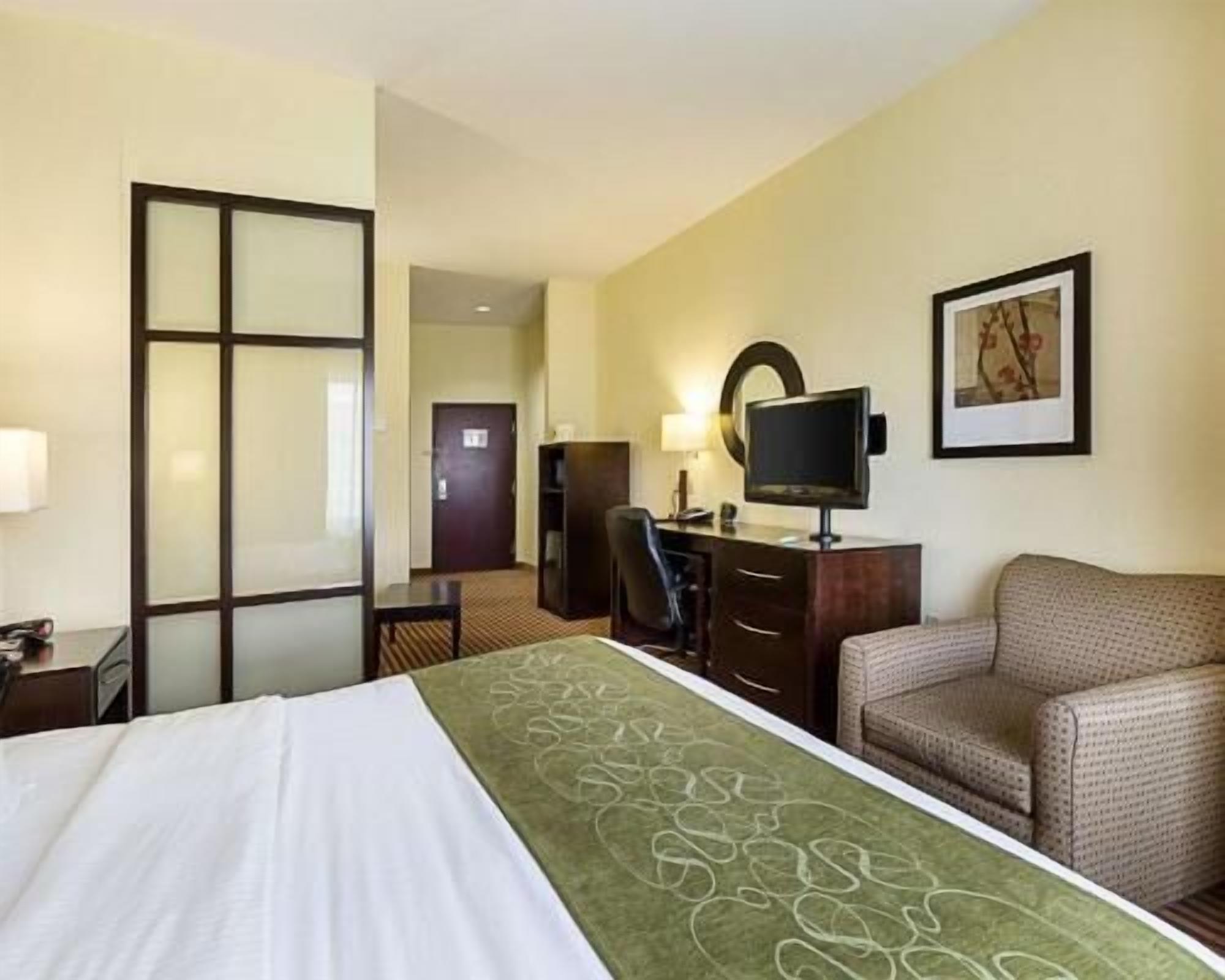 Pillowtop beds, desk, blackout drapes, iron/ironing board