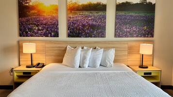 Pillowtop beds, desk, blackout drapes, iron/ironing board